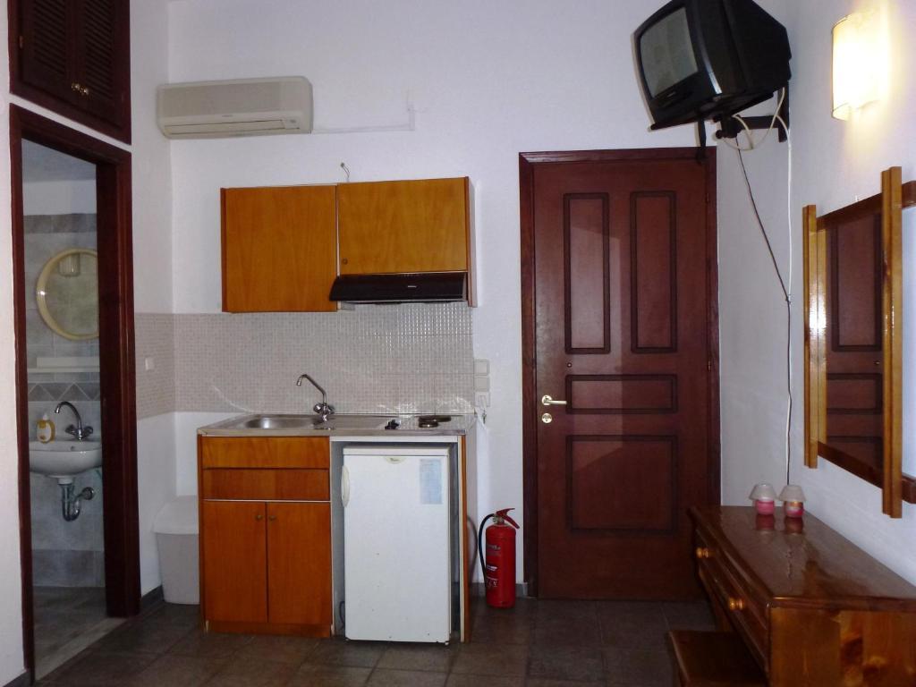 Odos Odysseos Aparthotel แอร์มูโปลี ห้อง รูปภาพ